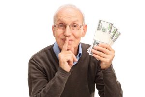 Here's an alt tag for the image: `Senior man holding cash, keeping secret`