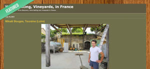 A man standing in front of an old building.