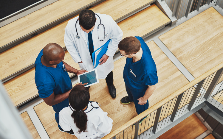 Medical team reviewing patient data.